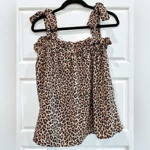 Entro brand, cheetah, tie top, tank.